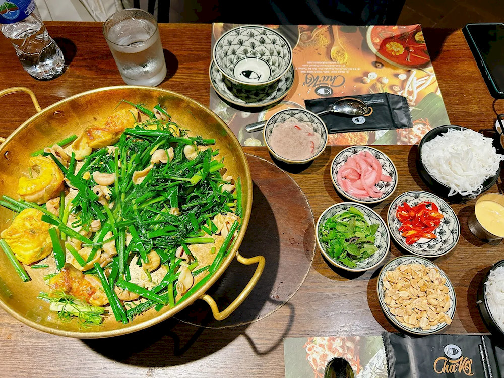 Cha ca here is well-marinated with a fragrant blend of galangal and lemongrass, while the fish is firm and flavorful 